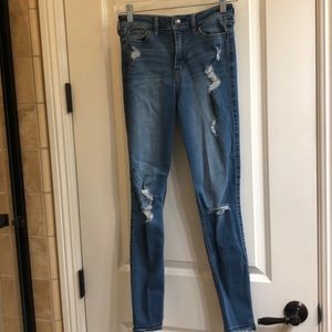 Distressed blue, high waisted, floral design jeans
